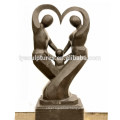 Stone abstract happy family in sculptures father and children statues